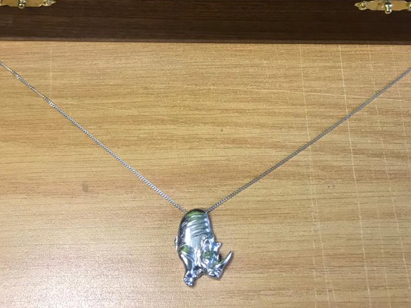 Rhino puzzle piece necklace
